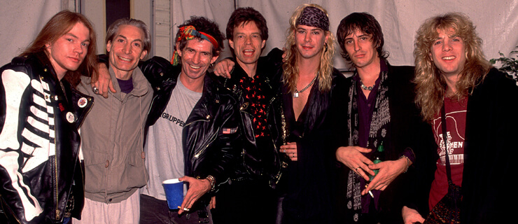 Rolling Stones e Guns N' Roses: Axl Rose, Charlie Watts, Keith Richards, Mick Jagger, Duff McKagan, Izzy Stradlin e Steven Adler na Steel Wheels Tour em 1989 - Los Angeles (EUA) - Paul Natkin/Image Direct